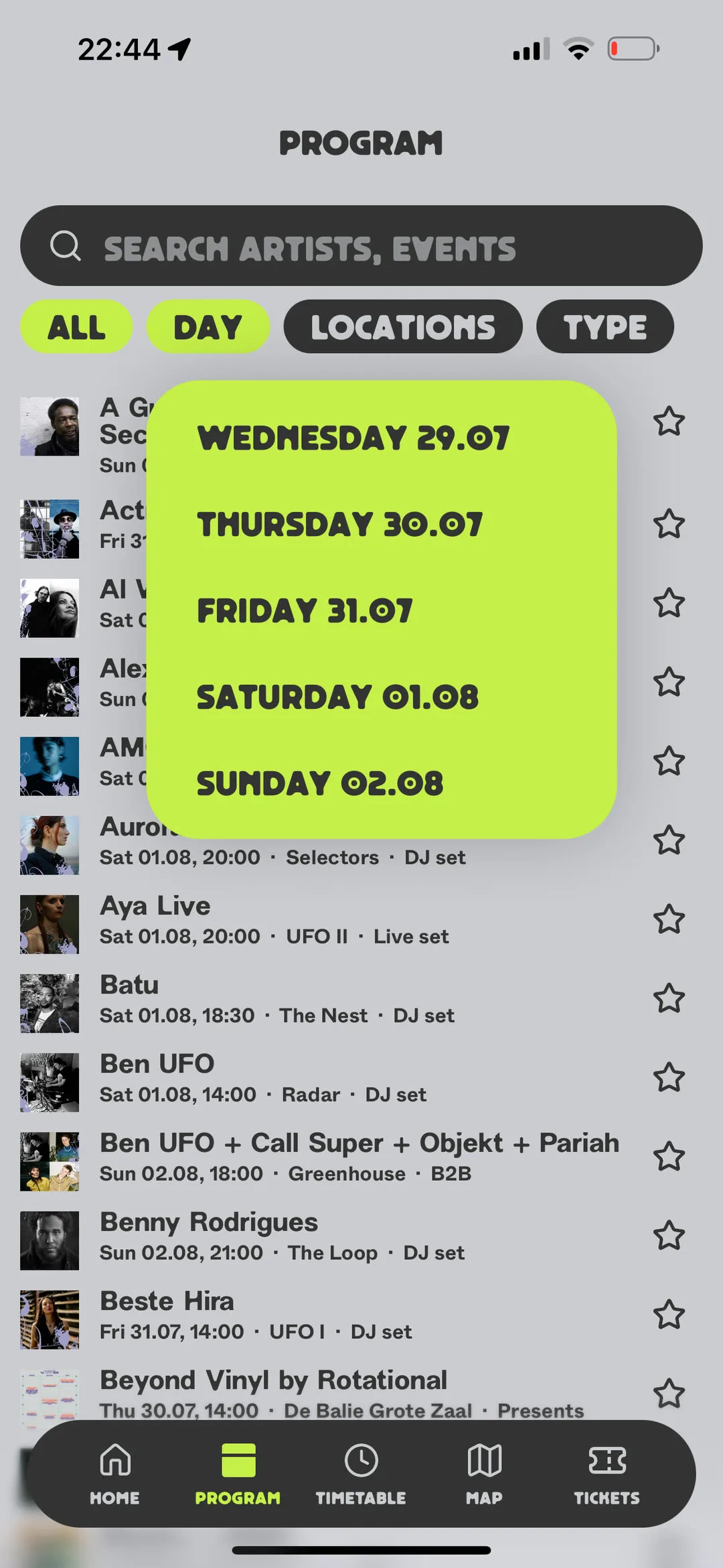 The day pill opened into a full acid green panel listing the festival days